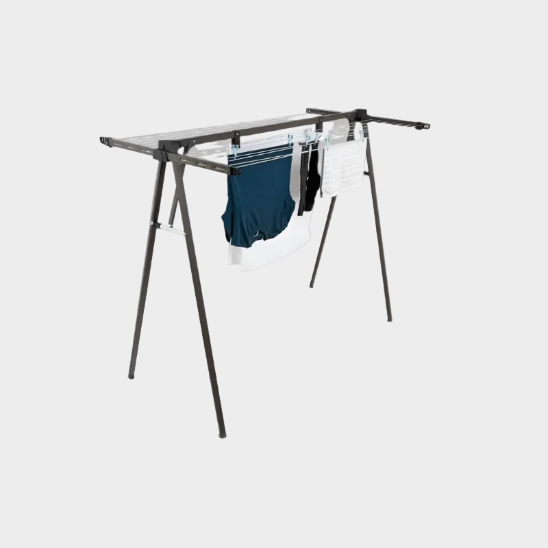 Clothes drying rack with clothes on a white background